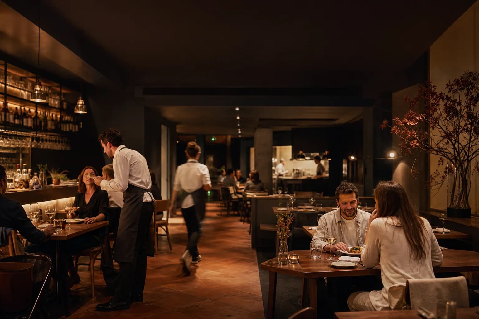 Equipo de hostelería atendiendo un restaurante contemporáneo